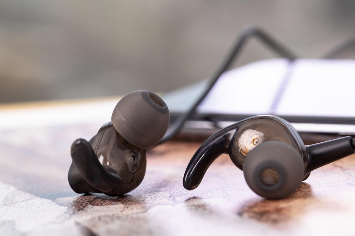 Wireless earphone charging case on a clean surface