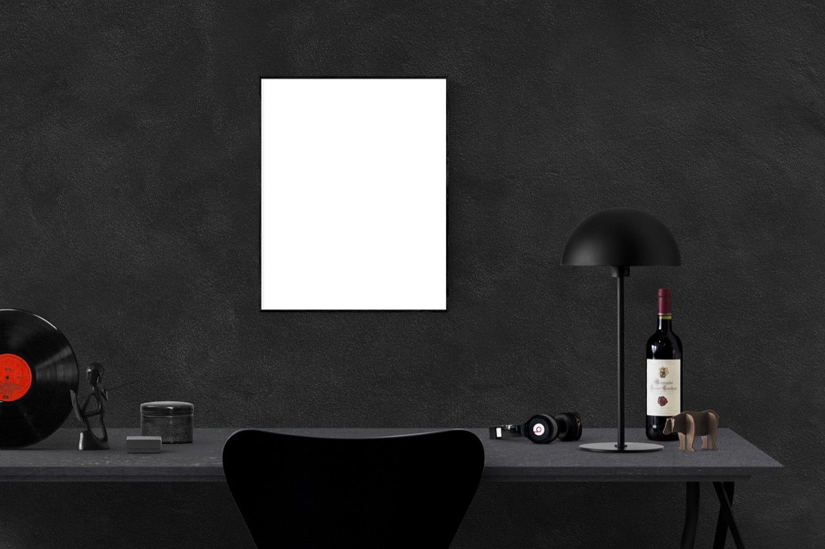 High-quality noise cancelling headphones and a modern LED desk lamp